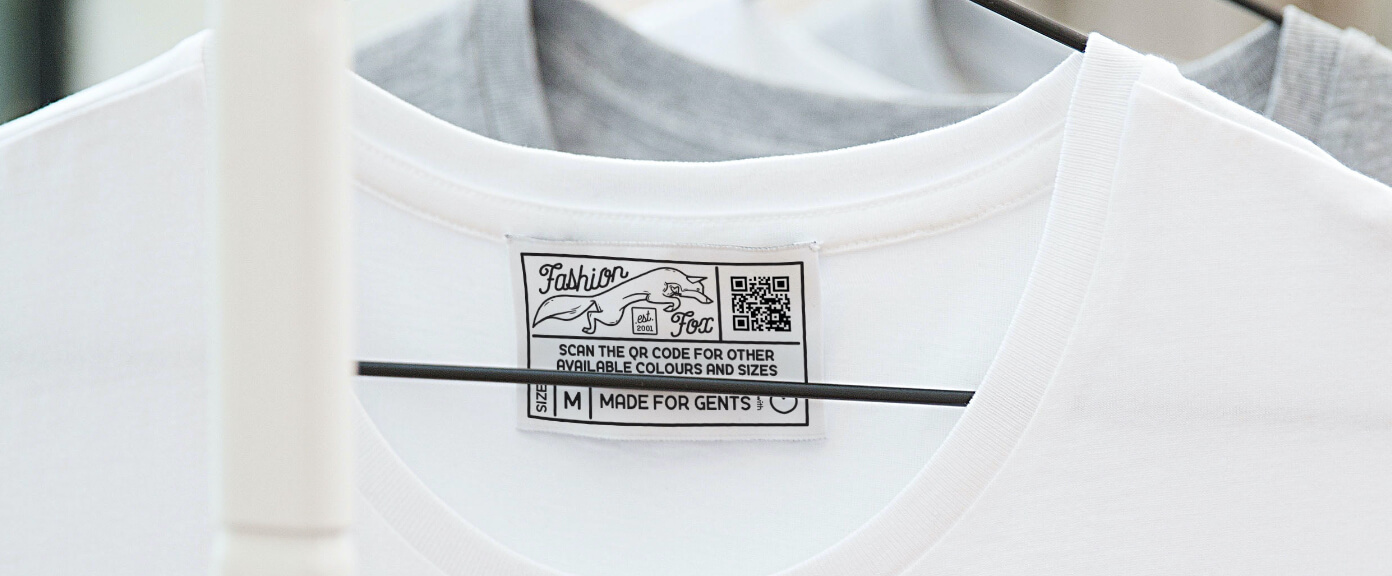 A clothing label with a QR Code that shows availability in different sizes and colors when scanned.