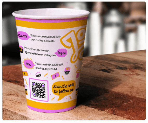 Coffee cup with a QR Code that links to all social media channels on one page.