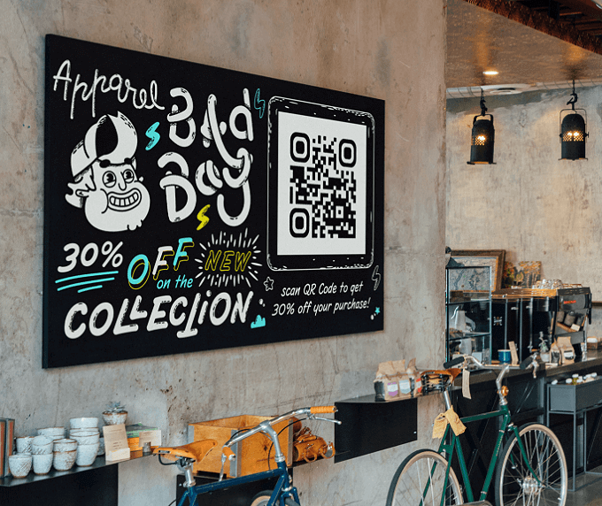 A store display of an apparel store with a QR Code that offers a discount coupon when scanned.