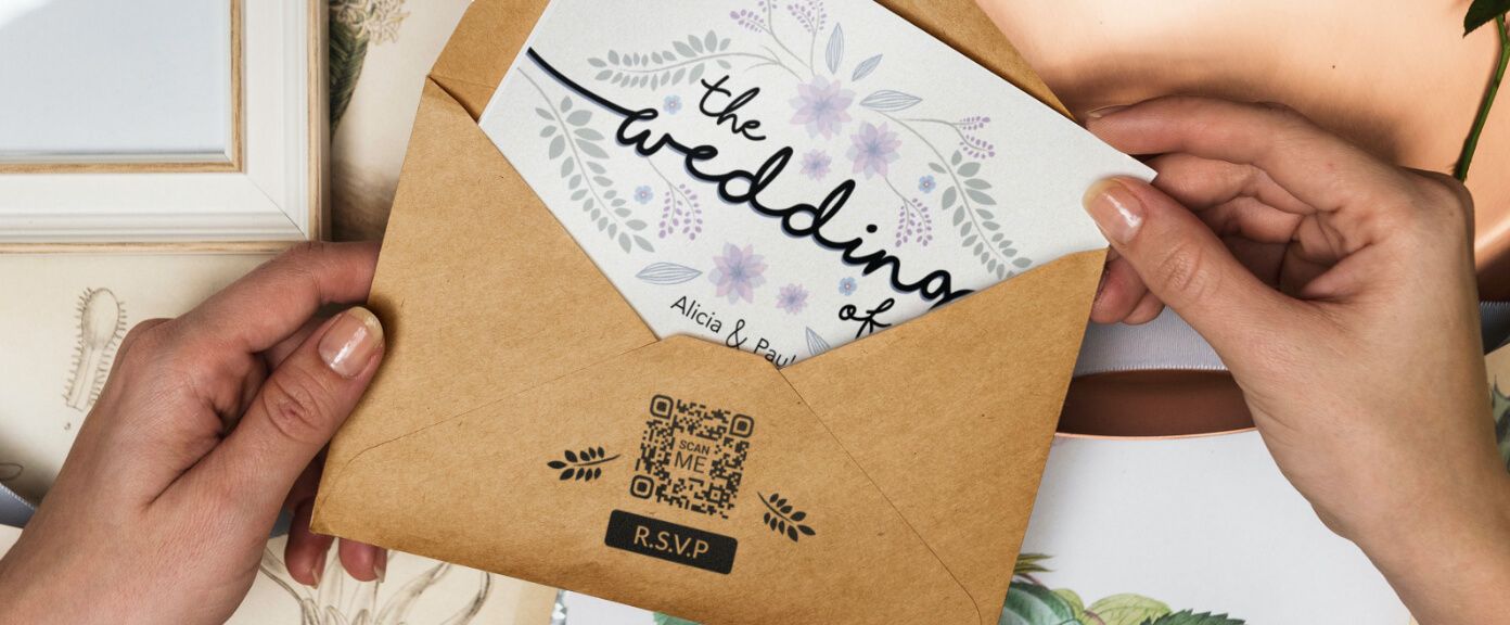 A wedding invitation card with a QR Code that lets users R.S.V.P and saves event details directly to their smartphone calendars.