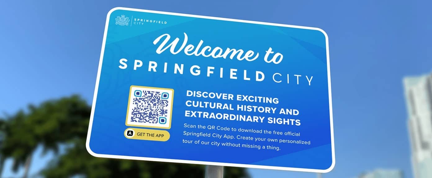 QR Code idea on a street sign to promote a city's app for tourists