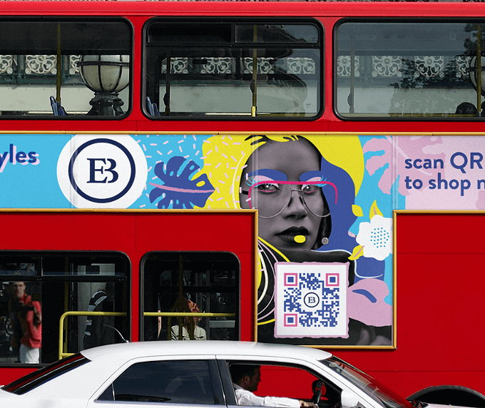 An advertisement on a bus with a QR Code that links to an online shop.