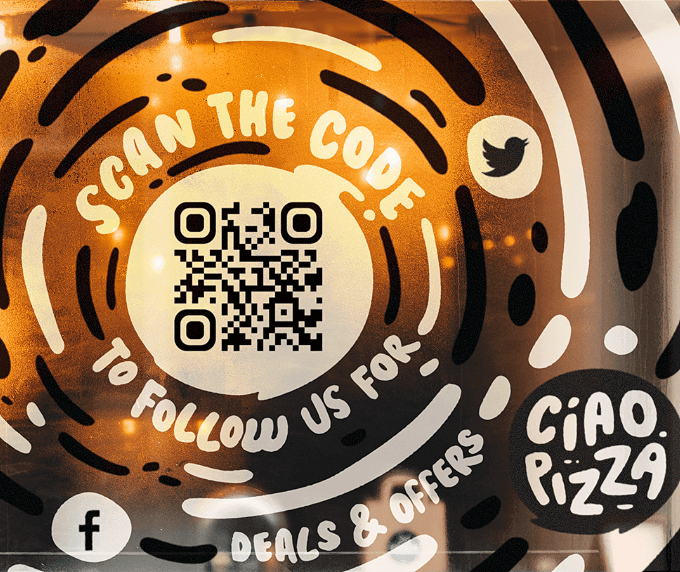 Restaurant window with a QR Code that links to all their social media channels on one page.